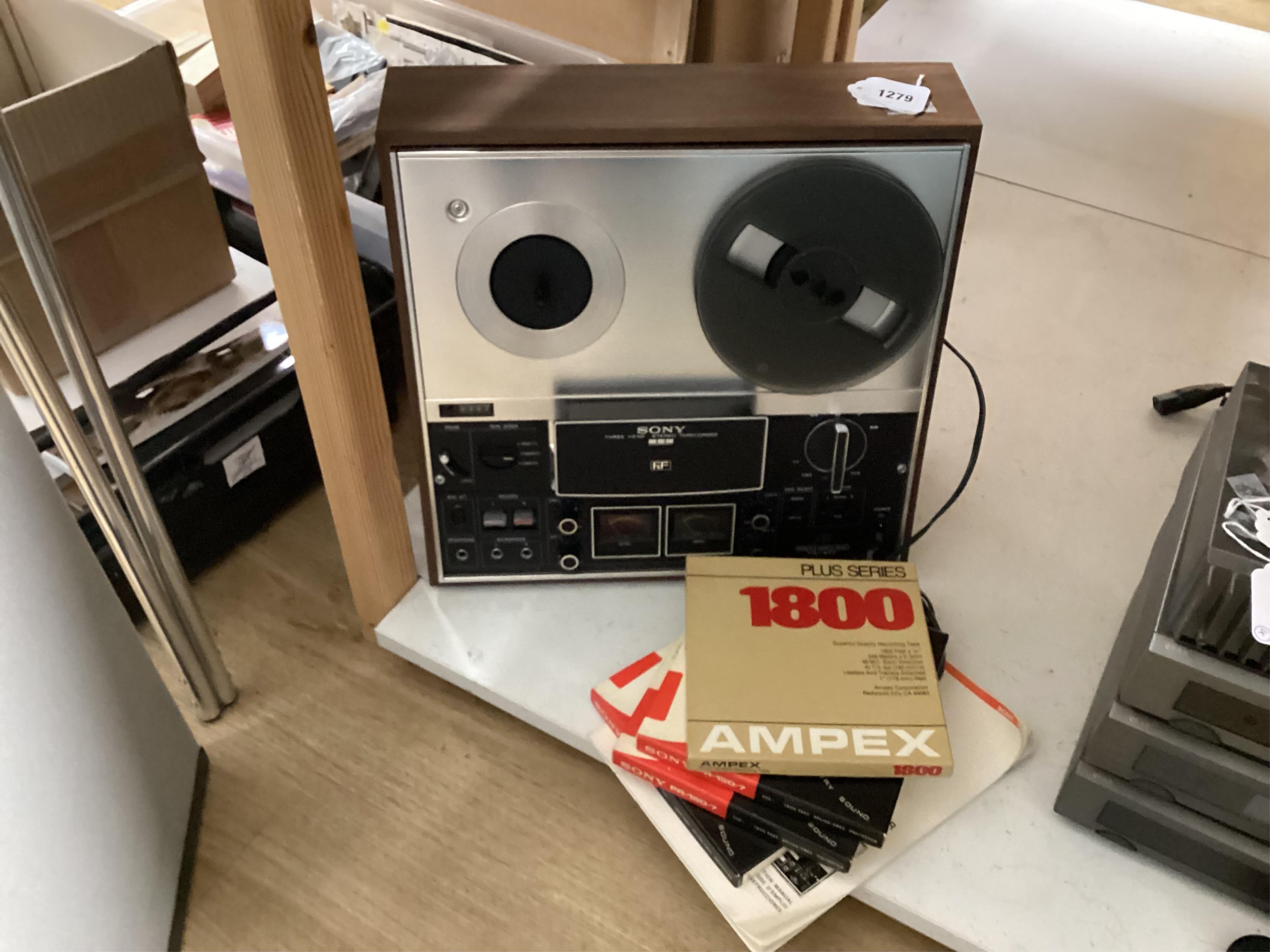 A Sony TC-377 reel to reel tape recorder with the original owners, instruction manual and four boxed reels